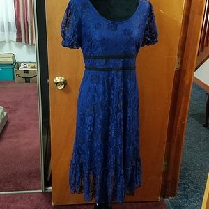 A blue midlength dress by Miami